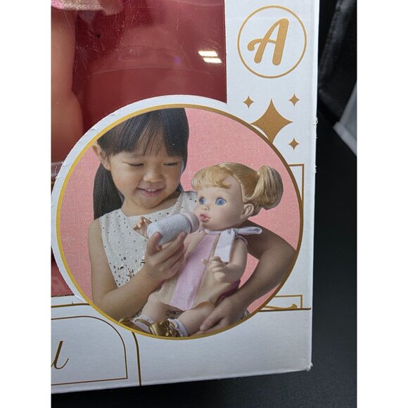 FAO Schwarz Drink and Wet Baby Doll with Brushable Hair and Bathable Body - Picture 6 of 10